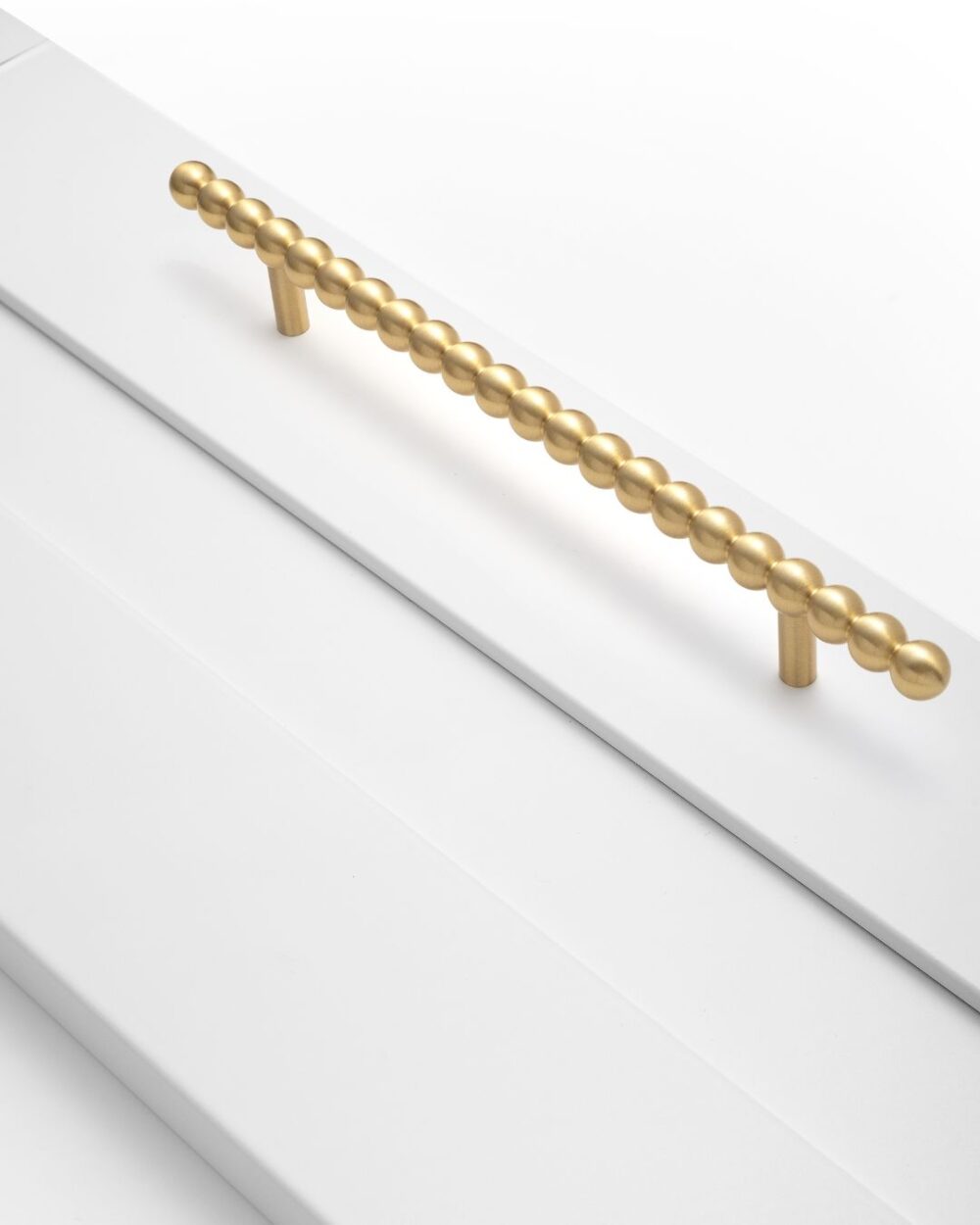 Daisy L brass furniture handle